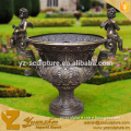 bronze flower pot with angel statue
